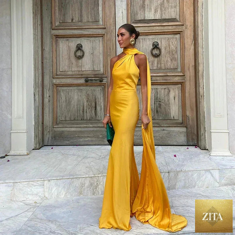 Femstylo backless lace-up maxi dress with ribbon sleeves, elegant sleeveless evening gown perfect for parties.