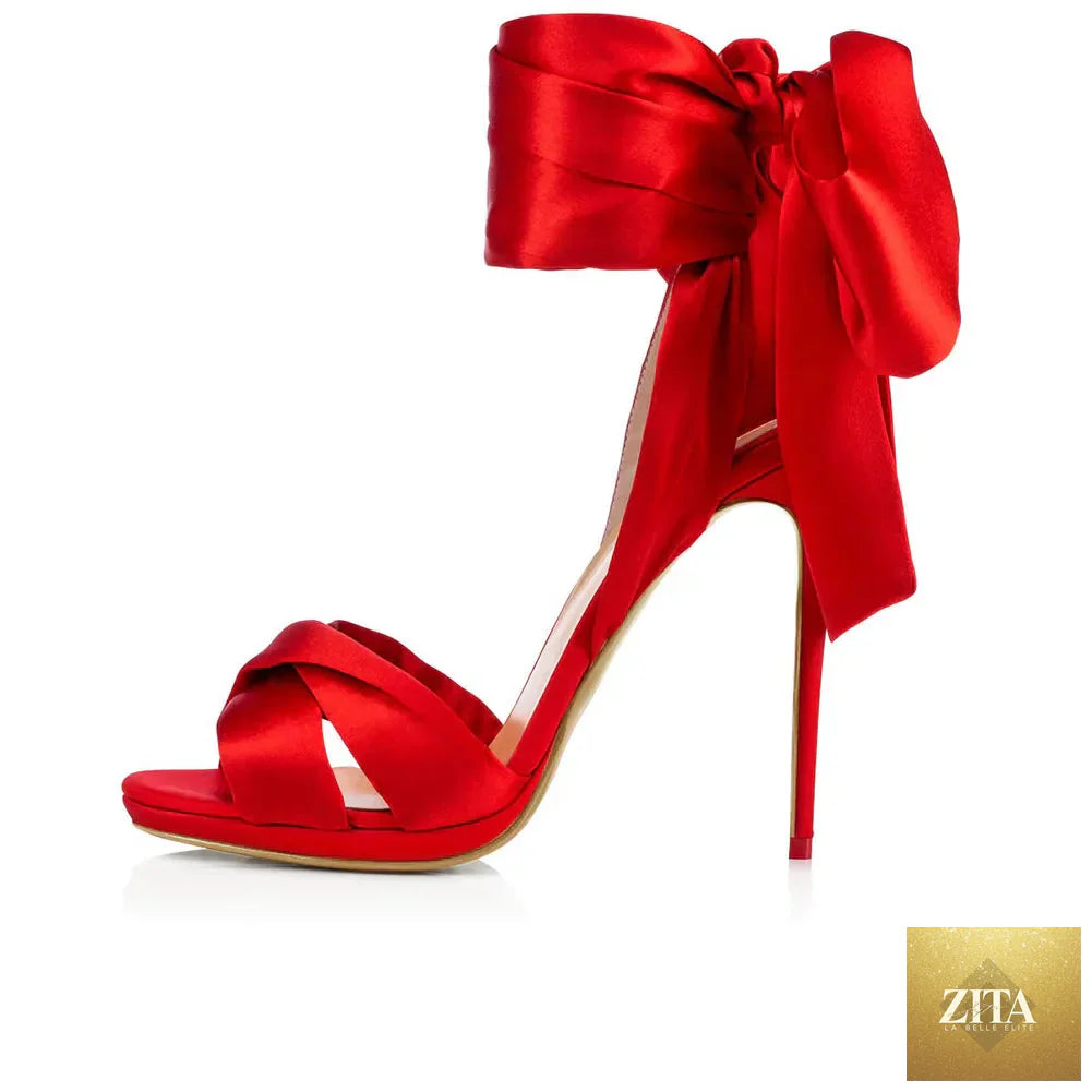 Summer satin bow cross-band open-toe women's sandals with thin high heels, stylish and sexy footwear from SMinvite, LLC.