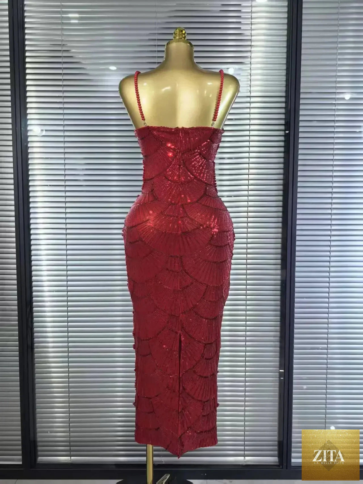 Pearl beaded sleeveless bodycon Christmas party dress by Femstylo, featuring elegant design with intricate pearl detailing.