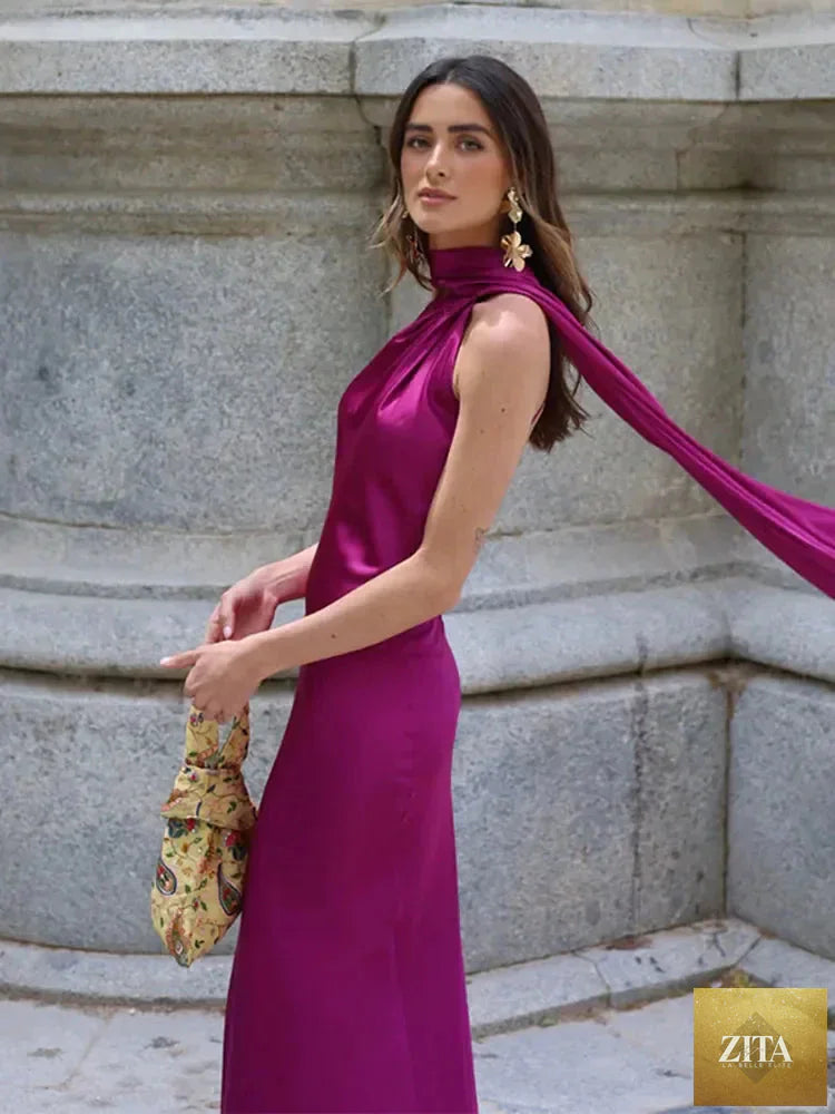 Backless lace-up maxi dress by Femstylo, sleeveless evening gown with ribbon details, perfect for parties and formal events.
