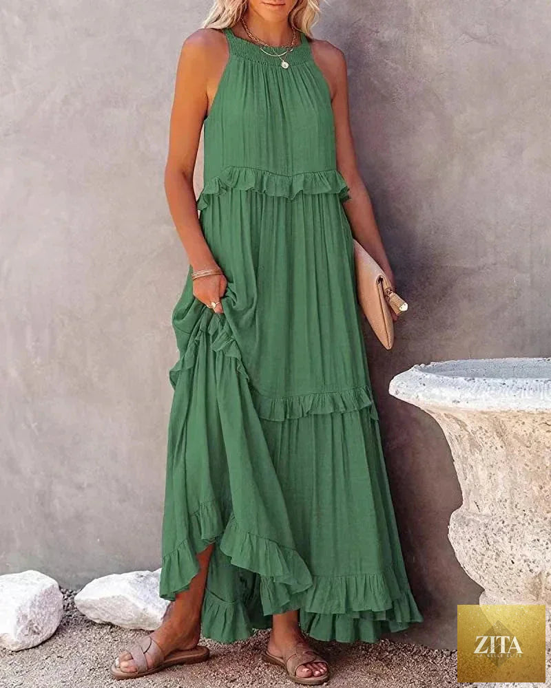 Elegant apricot ruffle maxi dress by Zita La Belle Elite, casualwear with flowing fabric and stylish ruffle details.