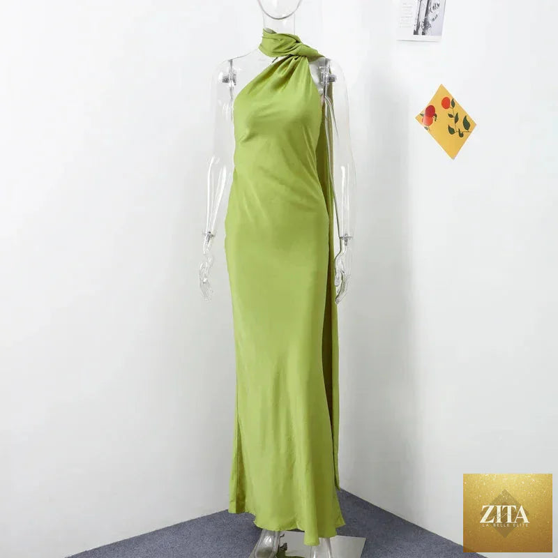 Backless lace-up maxi dress by Femstylo featuring sleeveless design, elegant ribbon accents, perfect for evening parties.
