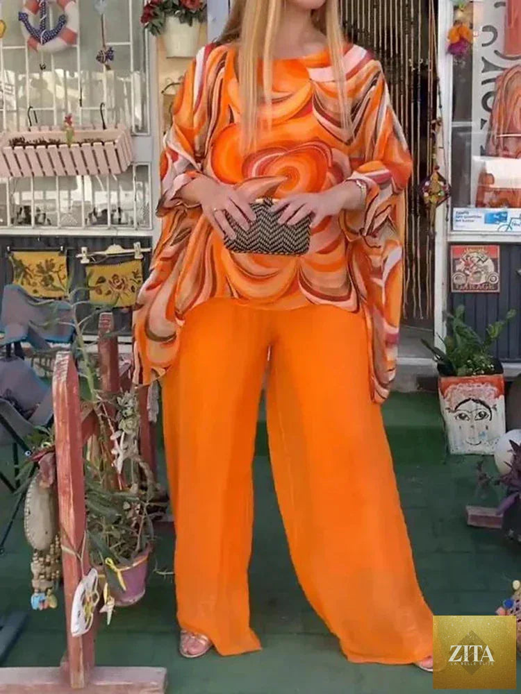Women’s chiffon two-piece set by Zita La Belle Elite, featuring an O-neck long sleeve top and wide-leg pants.