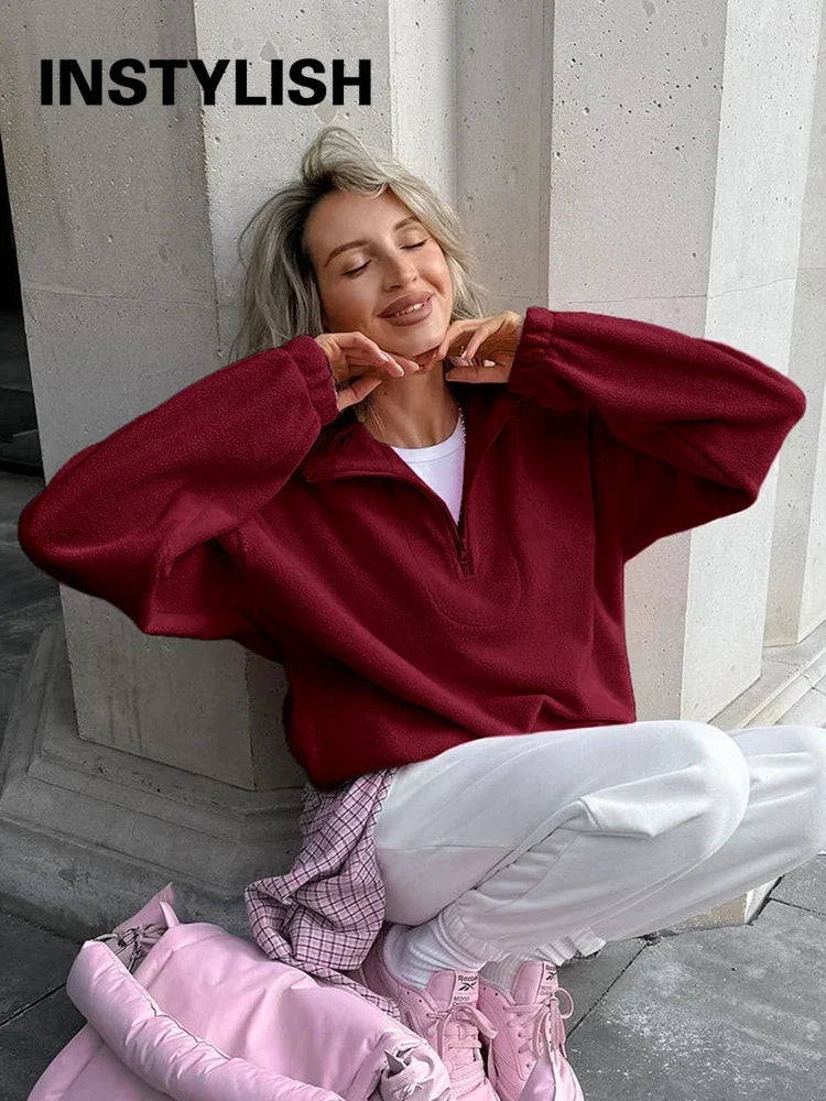 Women’s autumn winter fleece hoodie by LadyShow.Store featuring a stand collar, zipper, and casual loose fit in solid color.