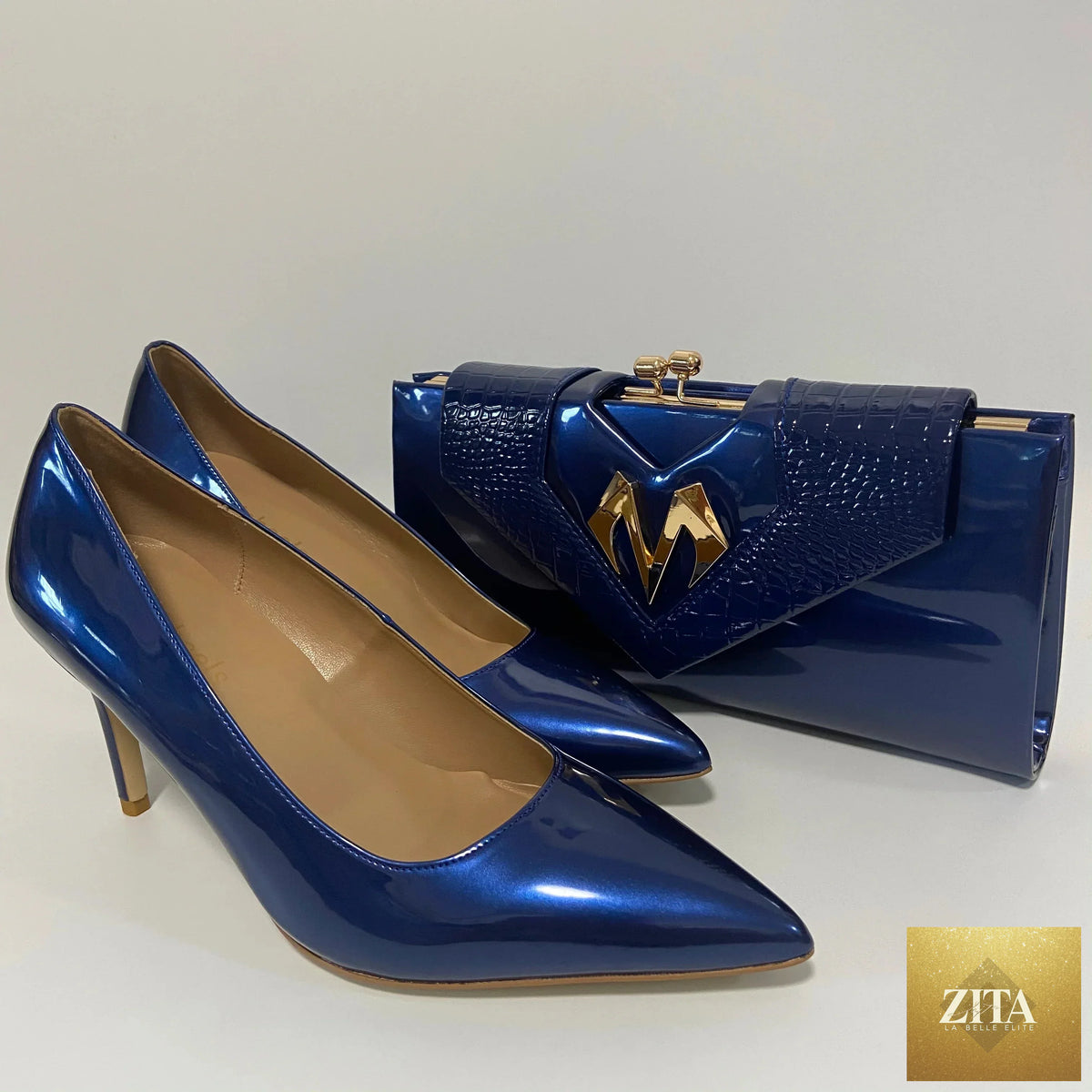 Elegant high heel shoes and matching bag from EdleessFashion, shown together in a stylish display on a neutral background.