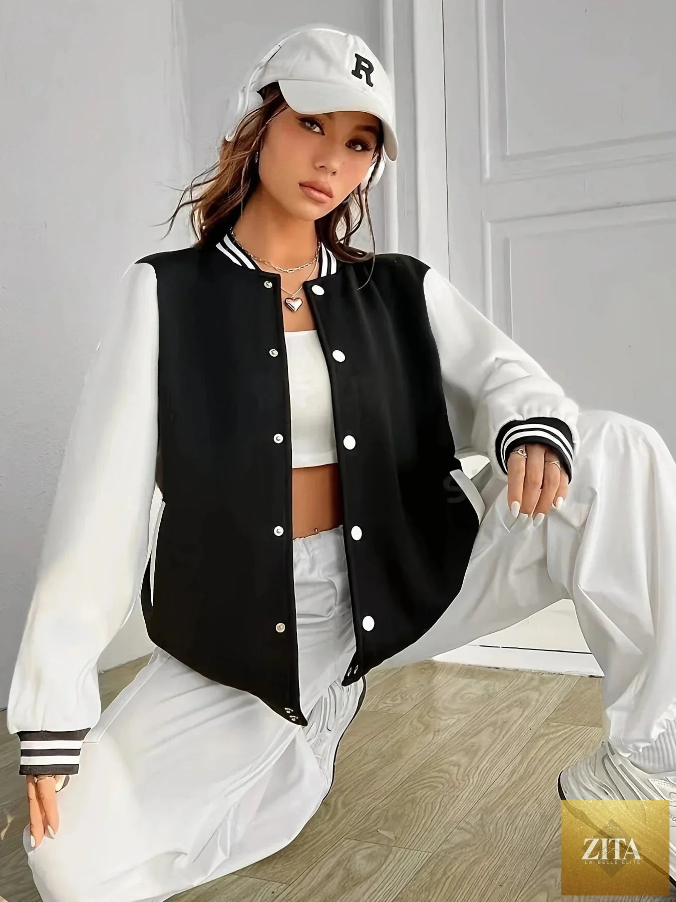 Women’s oversized solid color baseball jacket by FitiqueFit, shown with front view and casual style.