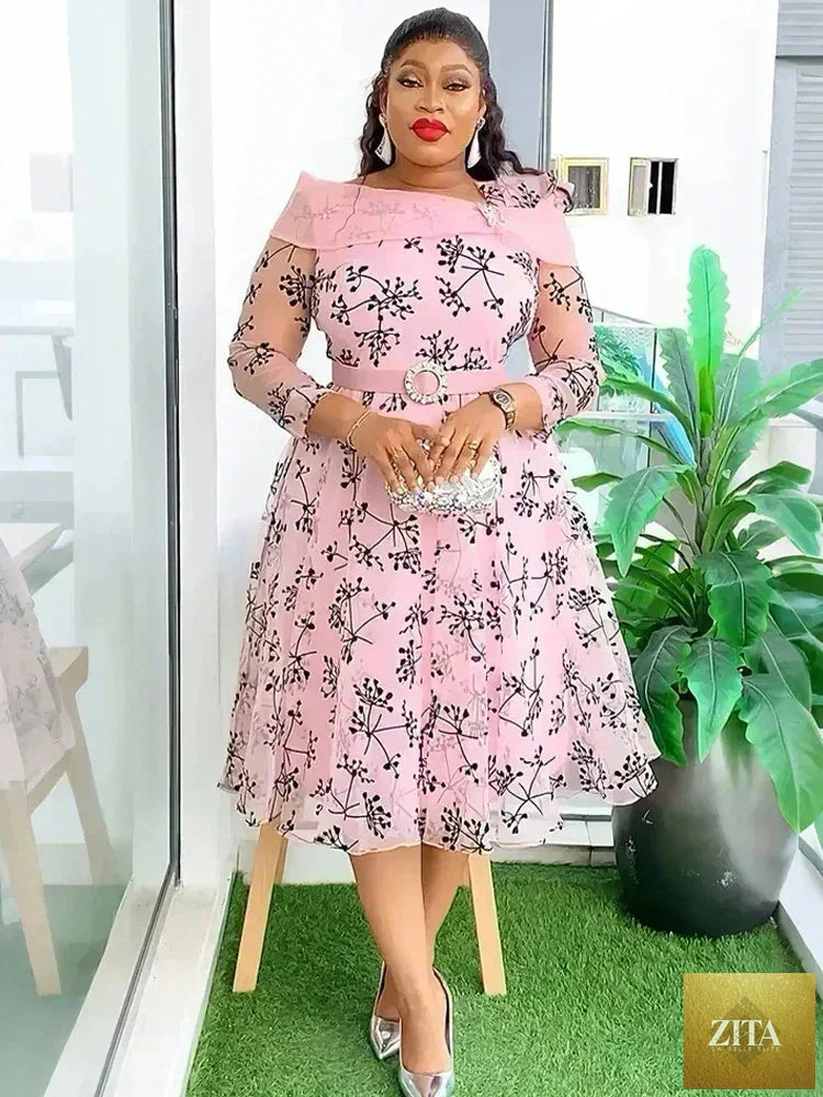 Elegant Femstylo women’s dashiki print midi robe, Dubai African evening gown with colorful dashiki design and stylish flowy fit.