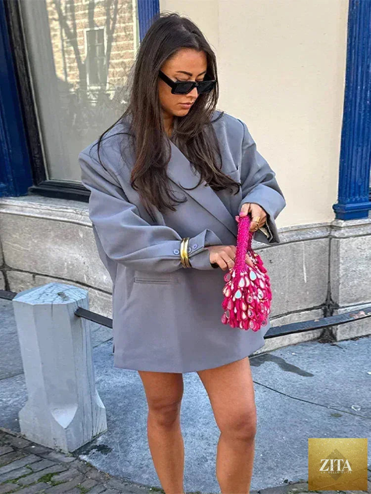 Women's Femstylo V-neck suit jacket with side buttons, long sleeves, solid color, oversized fit, and pocket cuffs.