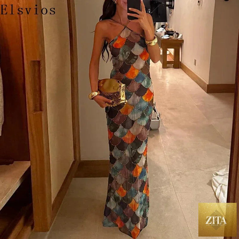 Elegant black, backless halter bodycon dress by FLIPSTYLEZLLC, featuring colorful block patterns and full-length evening style.
