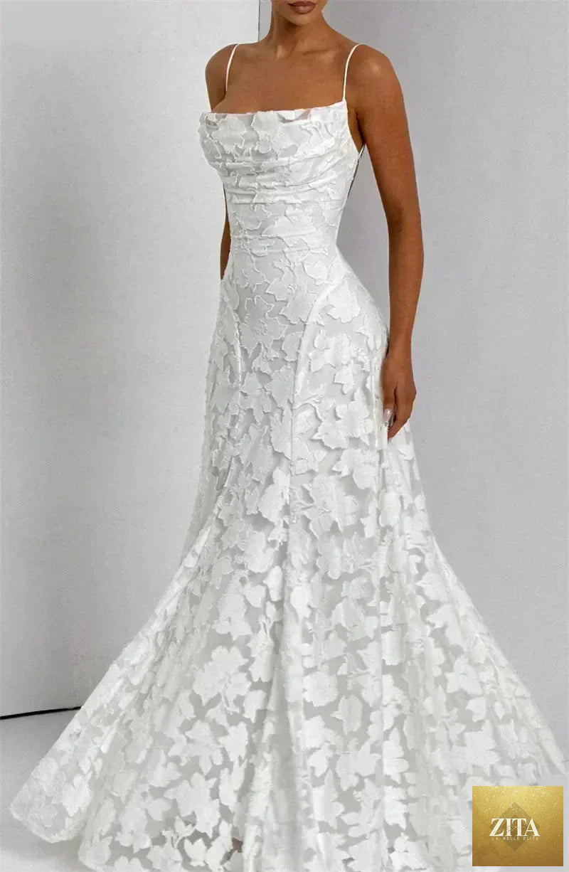 Femstylo spaghetti strap backless maxi dress with off-shoulder design, sleeveless lace-up style, perfect for evening or party wear.