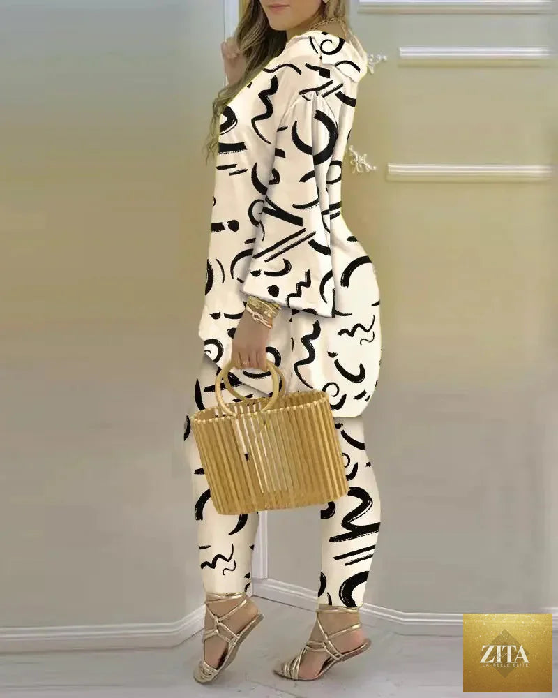 Women’s long sleeve V-neck polyester two-piece set featuring printed design, casual and stylish outfit by Trendy Attic Store01.