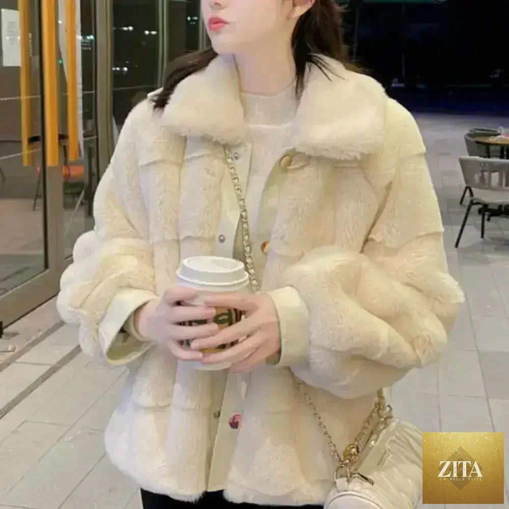 White faux fur jacket with vegan leather trimmed cuffs by Zita La Belle Elite, featuring a cozy, stylish design in size S to XXL.