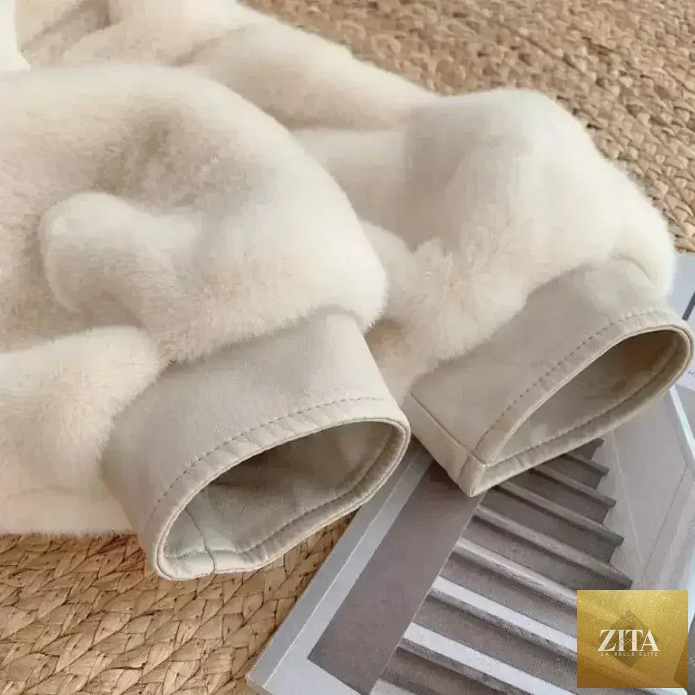 White faux fur jacket with vegan leather trimmed cuffs, available in sizes S to XXL, stylish outerwear from Zita La Belle Elite.
