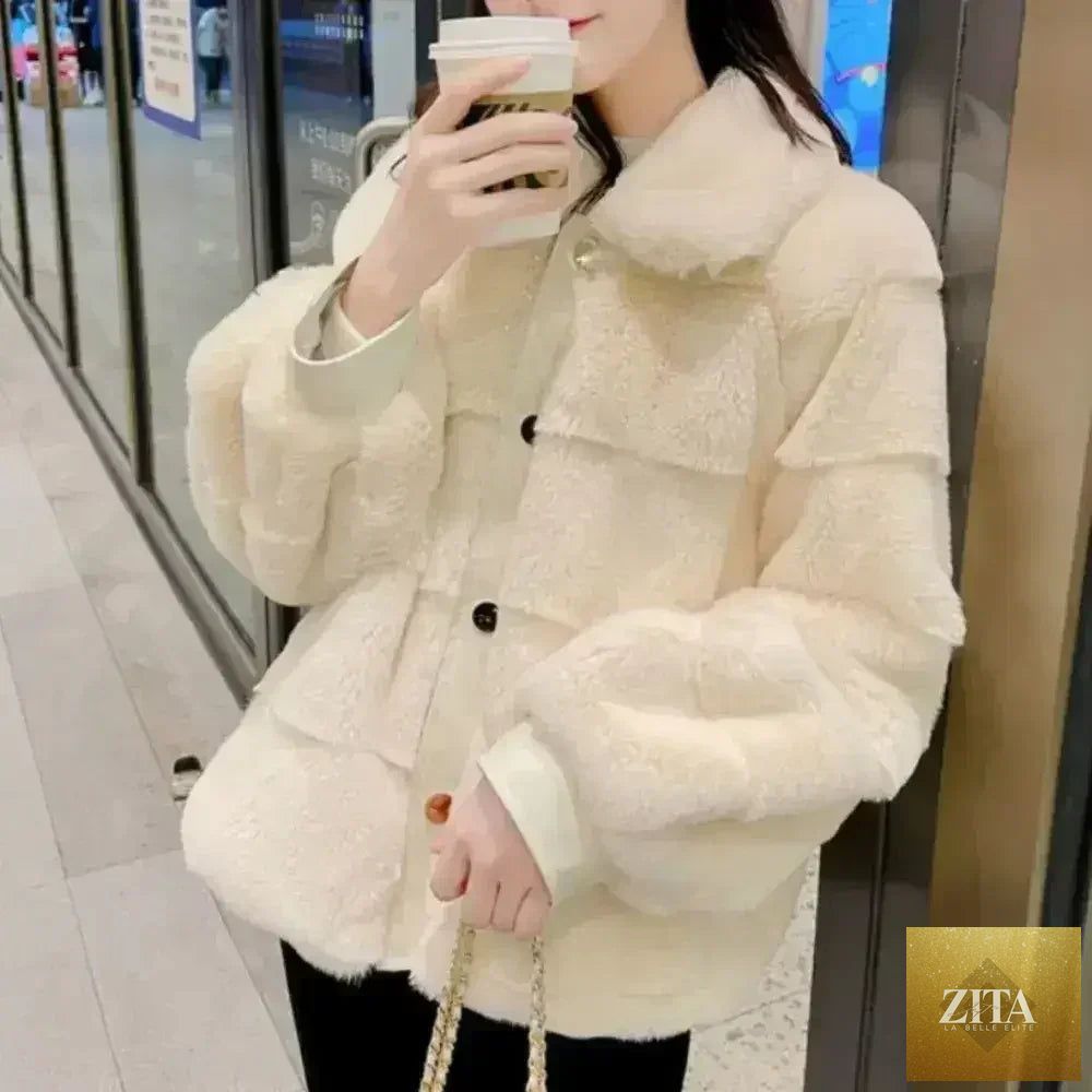 White faux fur jacket with vegan leather-trimmed cuffs from Zita La Belle Elite, available in sizes S to XXL.