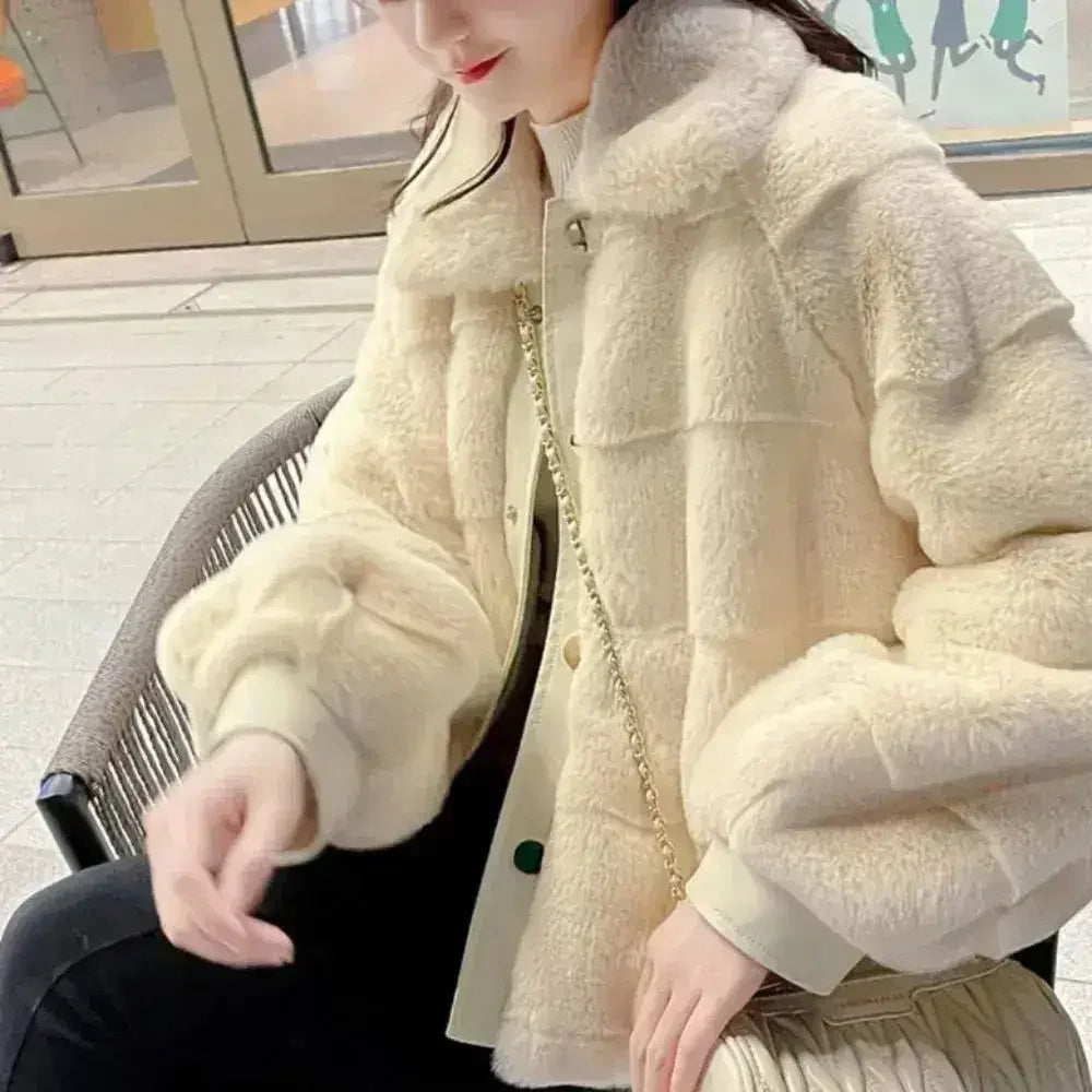 White faux fur jacket with vegan leather trimmed cuffs, Femstylo, available in sizes S to XXL, stylish and cozy outerwear.
