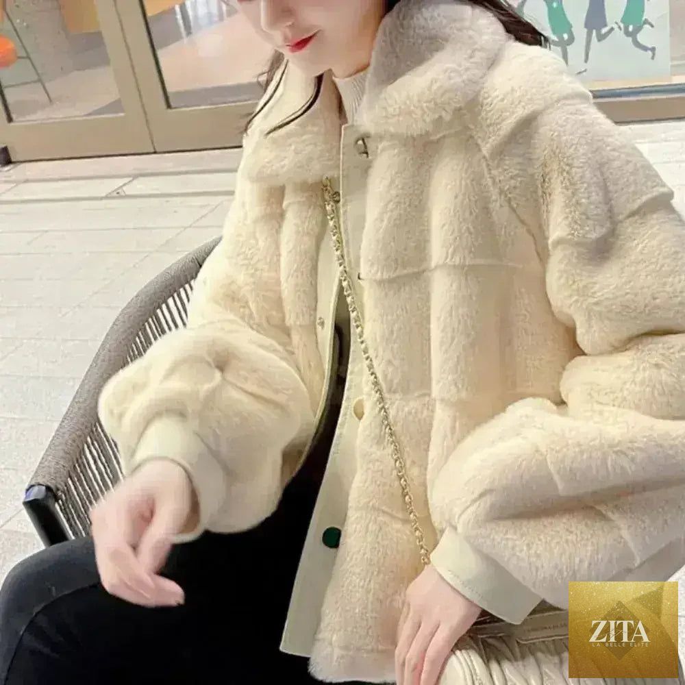 White faux fur jacket by Zita La Belle Elite with vegan leather trimmed cuffs, available in sizes S to XXL.