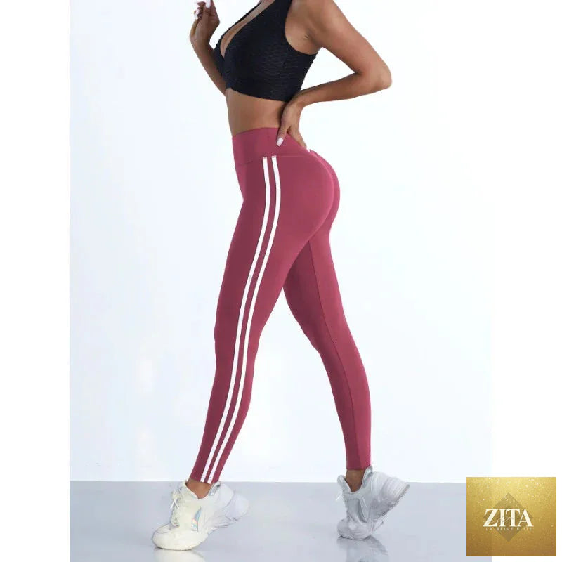 Women’s striped yoga leggings by 24 Hour Sport featuring a comfortable fit and stylish design.