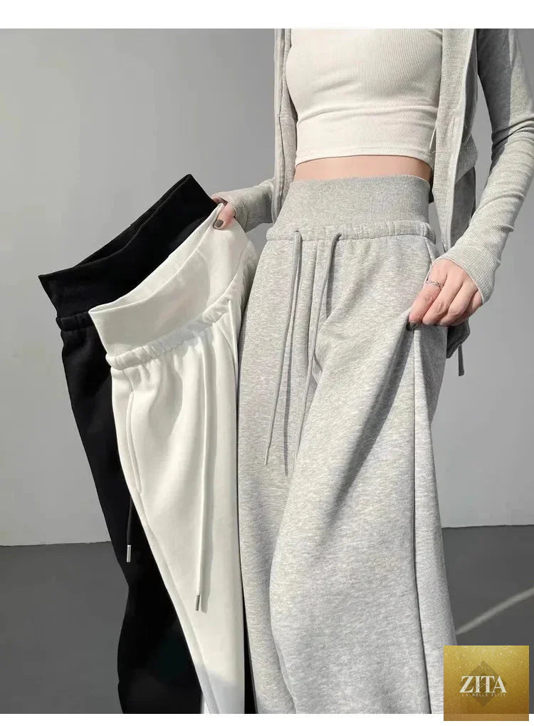 Gray high-waist loose wide-leg straight pants for women, casualwear by FitiqueFit, shown on a model.