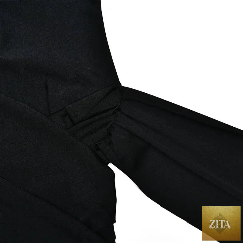 Femstylo sleeveless turtleneck mini dress with ruched, asymmetrical design, perfect for parties and evening events.