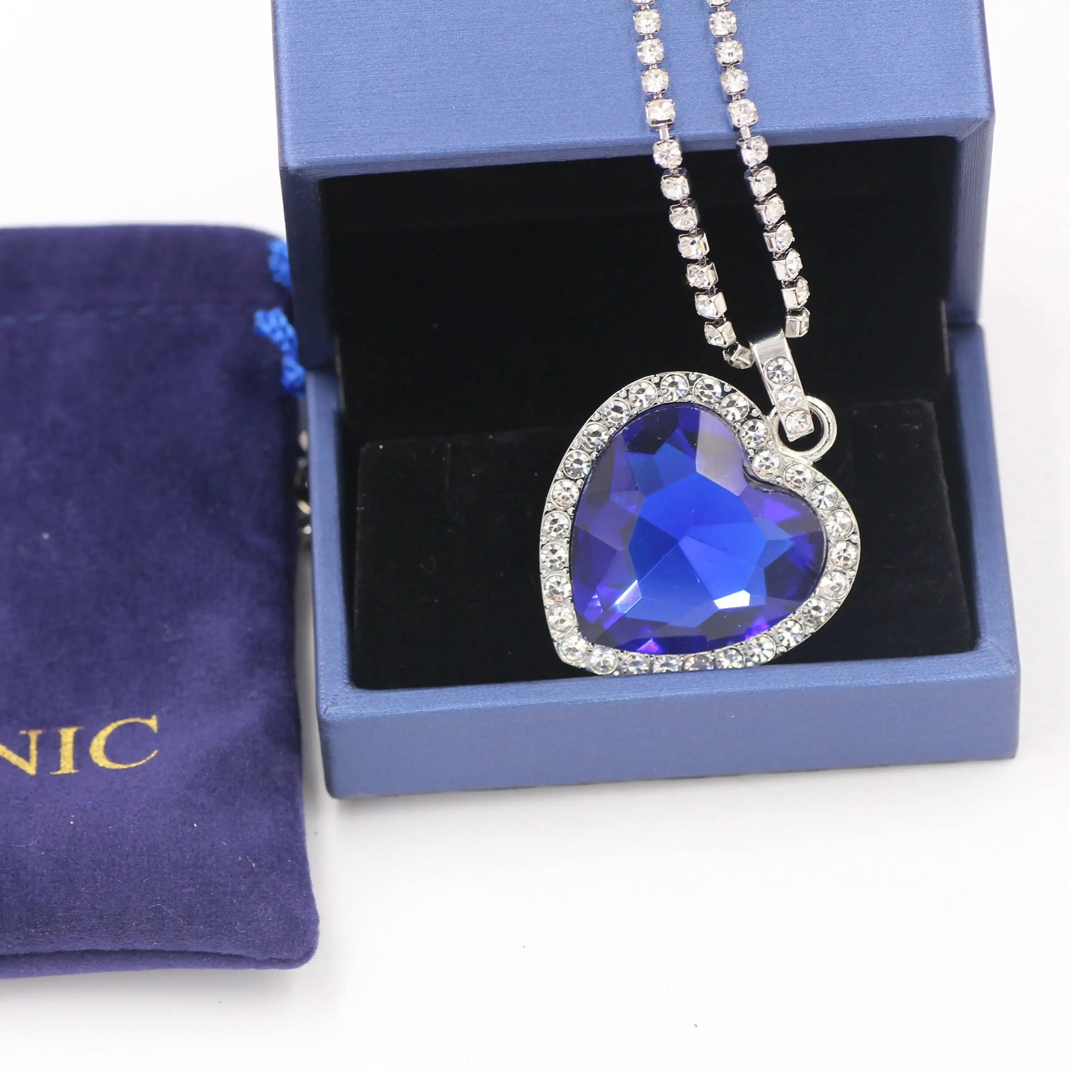 Titanic Heart of Ocean blue pendant necklace by FLIPSTYLEZLLC with velvet gift bag, featuring a heart-shaped ocean blue gemstone necklace.