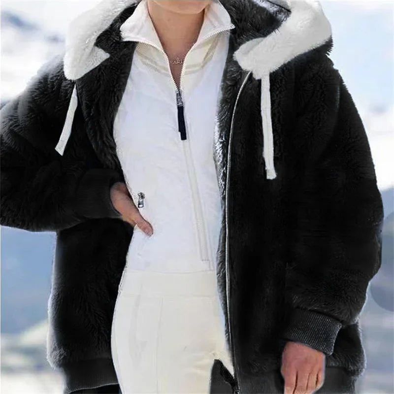 Women’s winter faux fur jacket with plush hood, soft fleece lining, and zipper closure, featuring a casual and fashionable design.