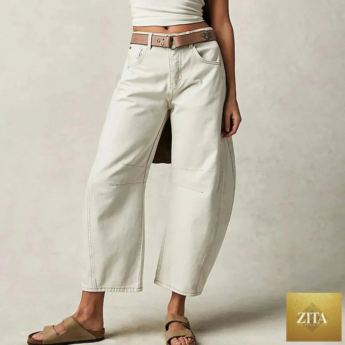 Women’s Y2K baggy mid-waist wide-leg jeans by Zita La Belle Elite, showcasing relaxed casualwear with a 90s streetwear vibe.