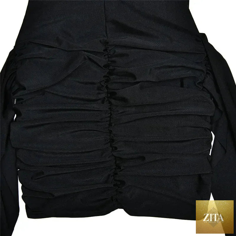 Femstylo sleeveless turtleneck mini dress with ruched, asymmetrical design, perfect for parties, shown in a stylish black fabric.