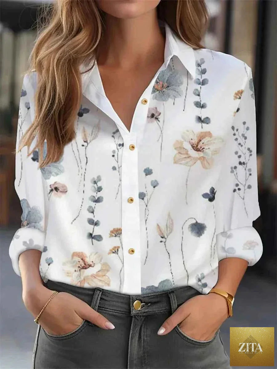 Elegant loose printed blouse for women by THRIXINE, featuring a stylish design and comfortable fit, ideal as an active top.