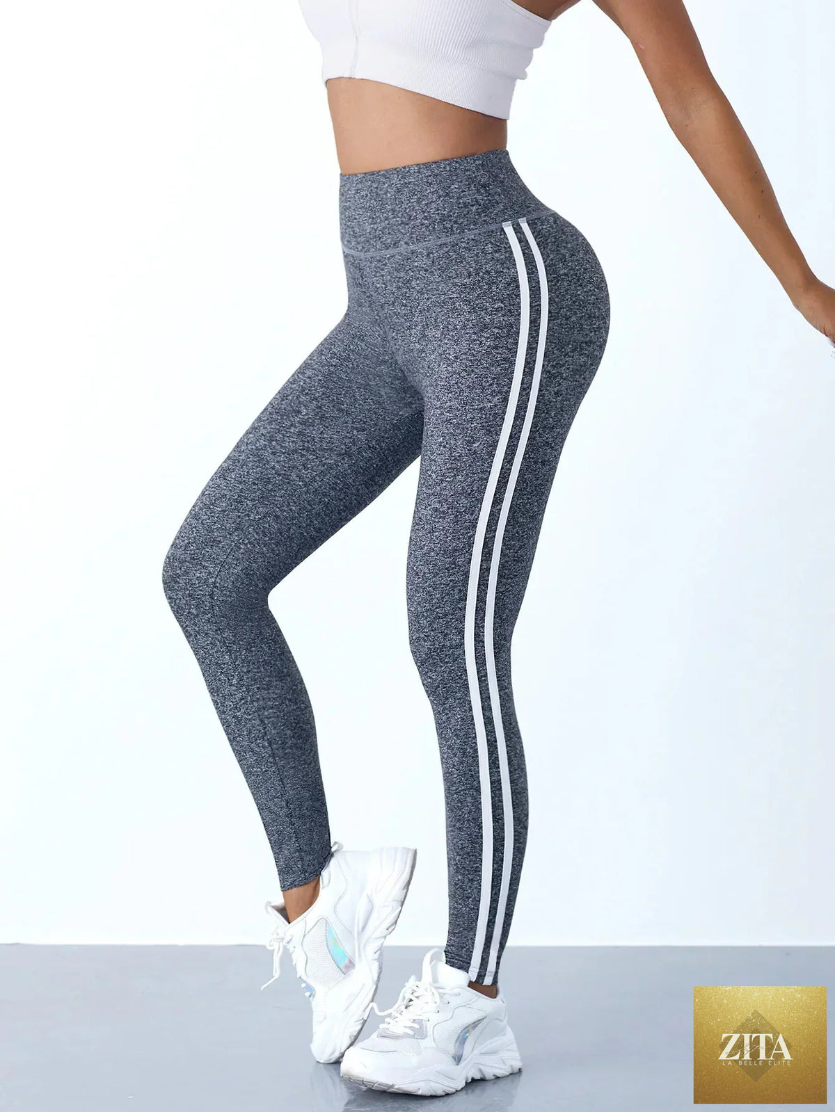 Women's striped yoga leggings from 24 Hour Sport, featuring a comfortable fit and stylish design for active wear.