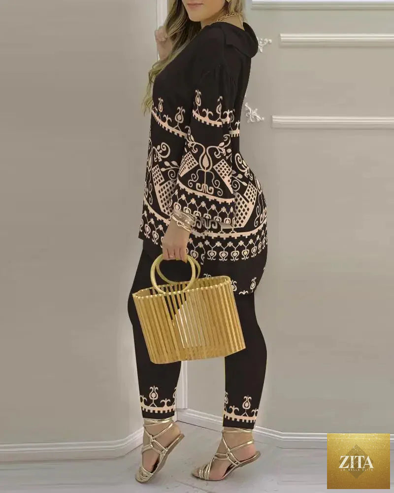 Women’s long sleeve V-neck two-piece set made of printed polyester fabric, stylish and comfortable for casual wear.