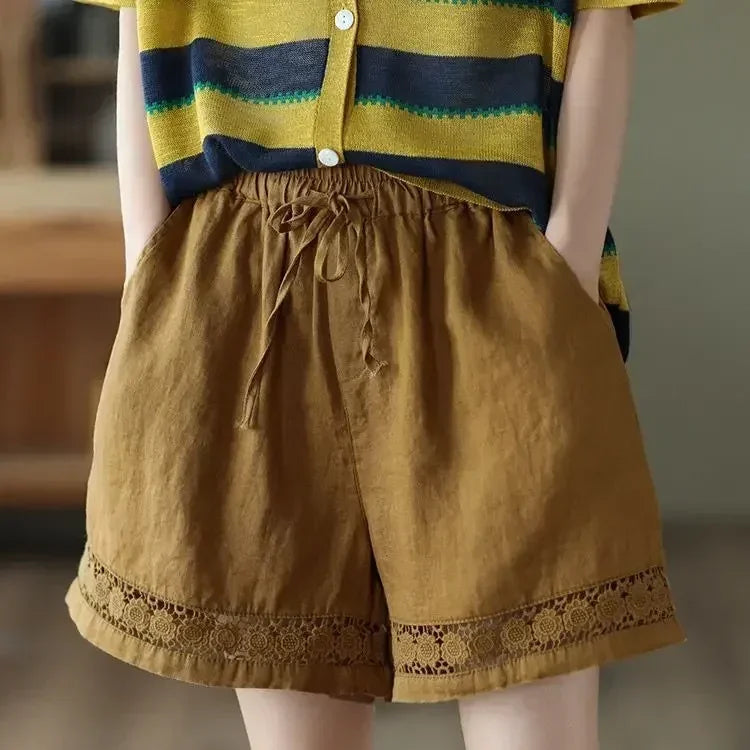 Cotton linen vintage high-waist shorts by Femstylo with tie-belt, embroidered hollow design, casual straight fit, new style.