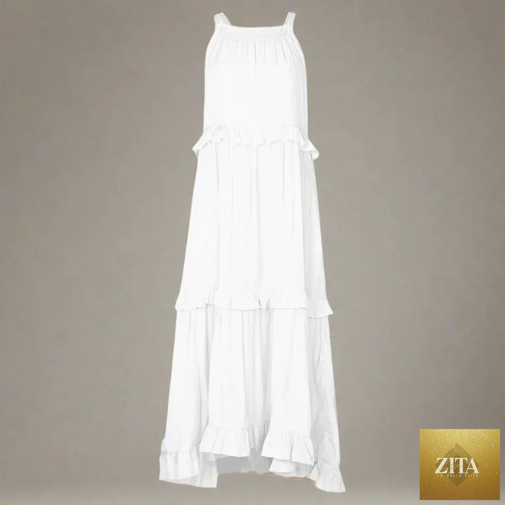 Elegant apricot ruffle maxi dress by Zita La Belle Elite, casualwear style with flowing fabric and ruffled details.