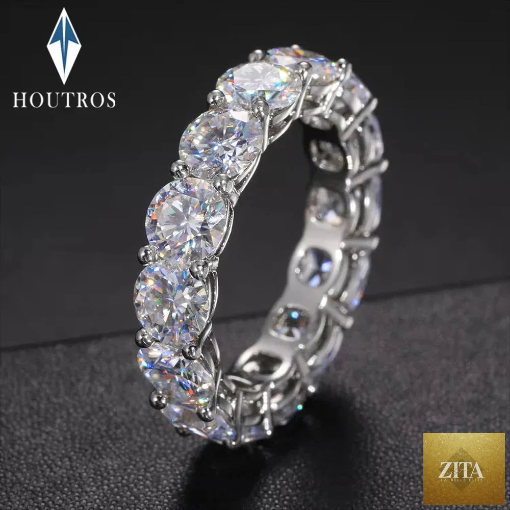Sterling silver wedding band with 5mm D color moissanite row, certified fine jewelry, ideal for women’s wedding or gift.