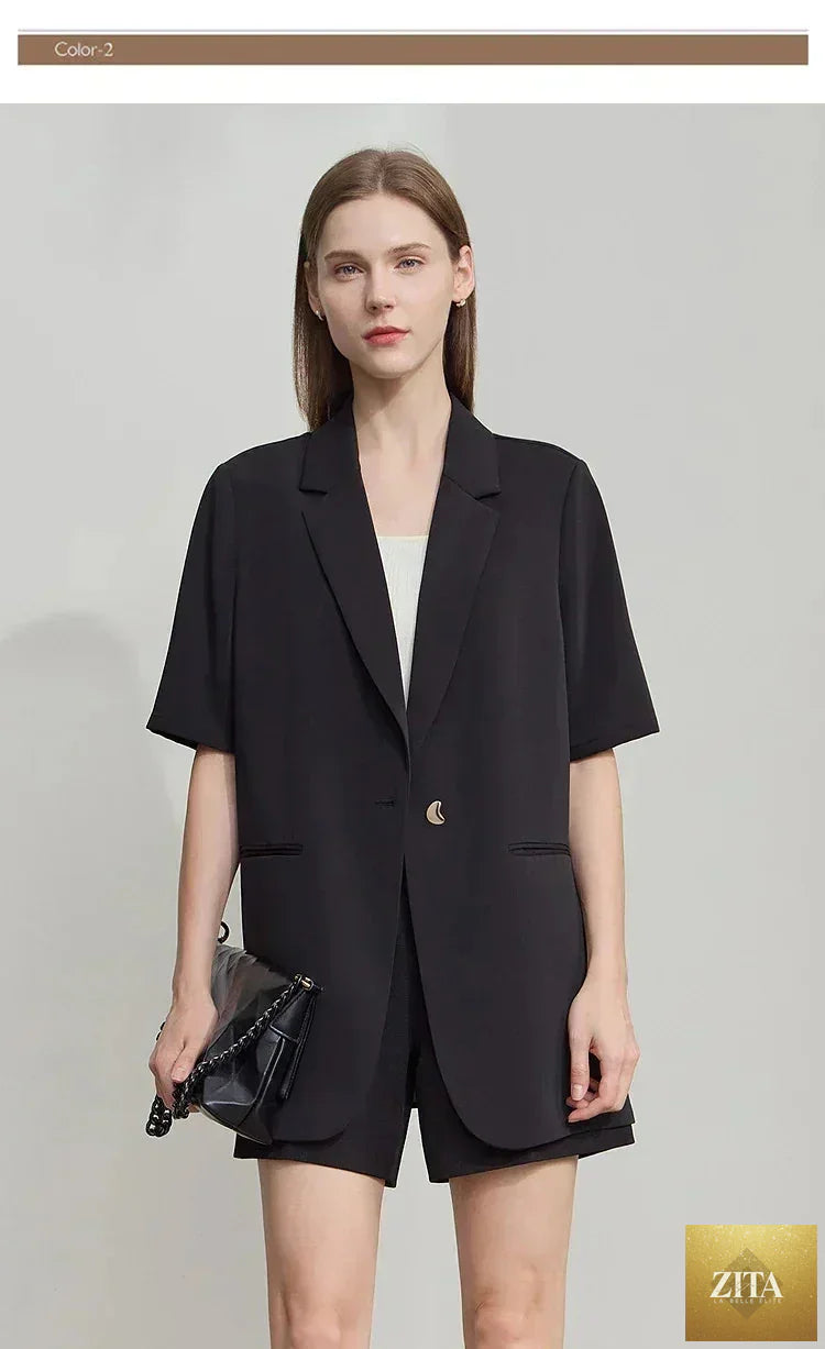 Femstylo Amii women's summer blazer with notched lapel, contrast patchwork, short sleeves, and one-button closure.