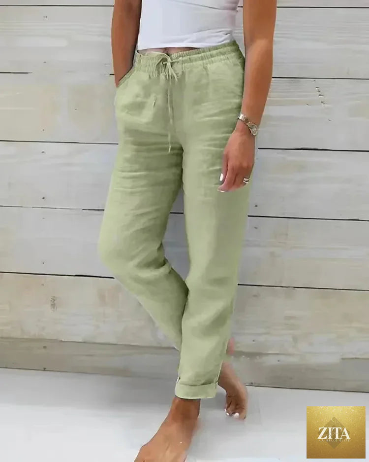 Women's high waist cotton linen summer pants by Ladyez, loose elastic casual trousers with a pencil fit in solid color.