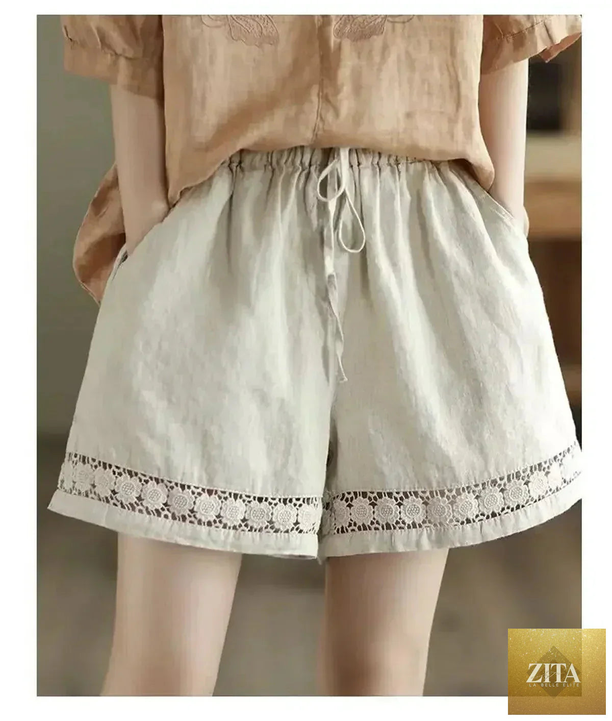 Femstylo cotton linen high-waist shorts with tie-belt, embroidered hollow design, casual straight fit, vintage style.