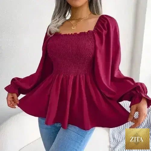Femstylo loose fit chiffon blouse, elegant polyester top with flowing fabric and stylish design, ideal for casual or dressy occasions.