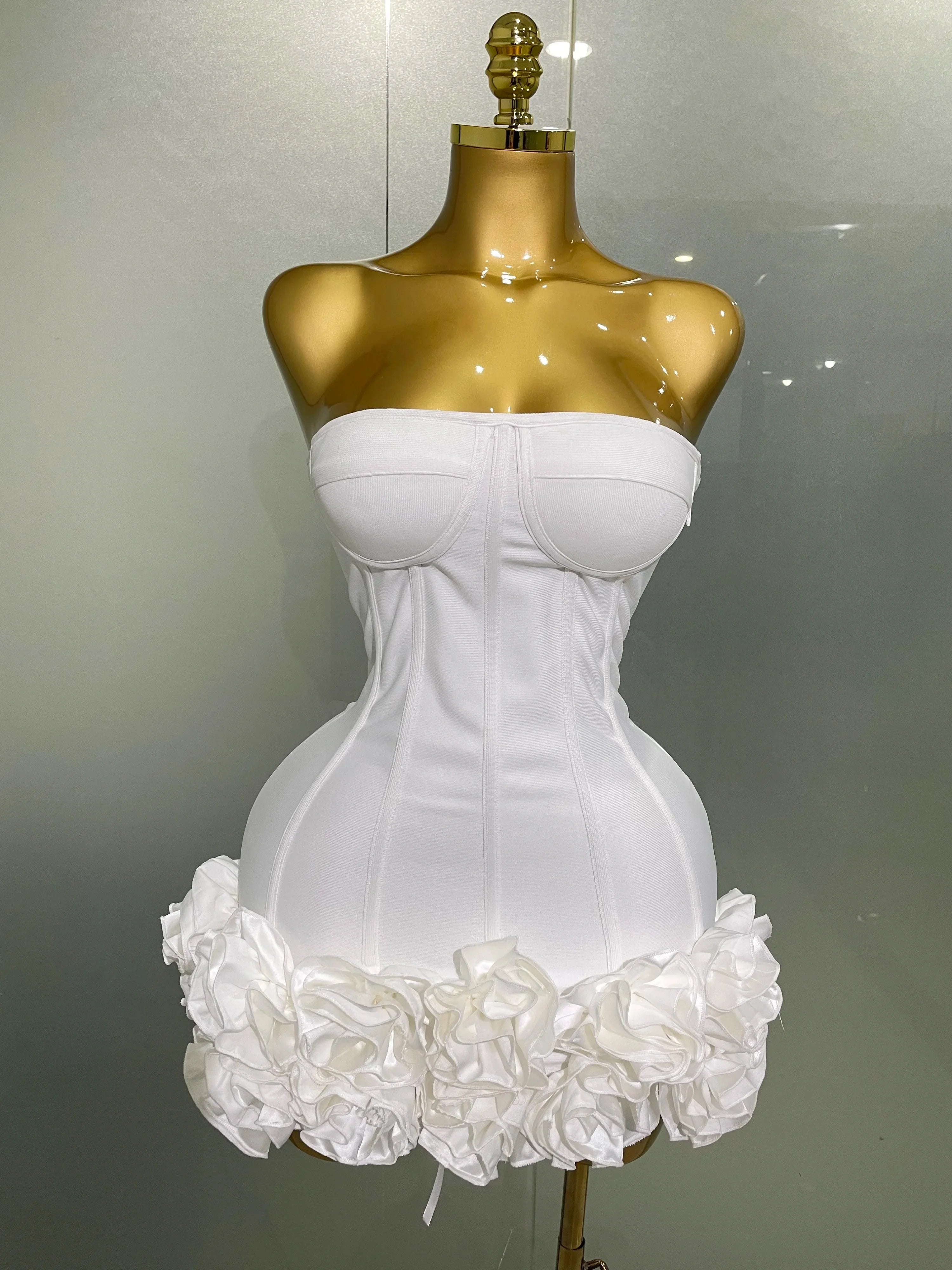 Black strapless bandage dress by FLIPSTYLEZLLC featuring floral embellishments, bodycon fit, perfect for evening parties or photo shoots.