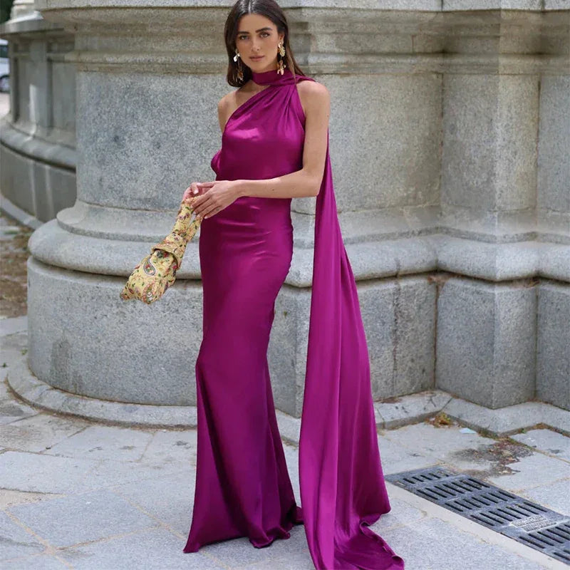 Backless lace-up maxi party dress by Femstylo featuring sleeveless design and elegant ribbon accents