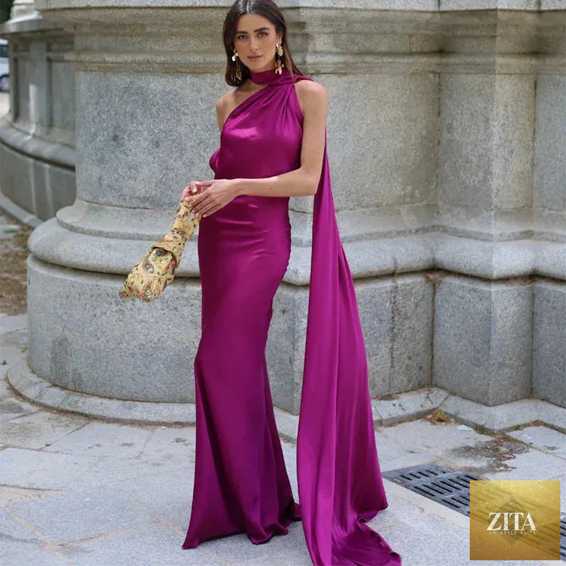 Backless lace-up maxi party dress by Femstylo featuring sleeveless design and elegant ribbon accents