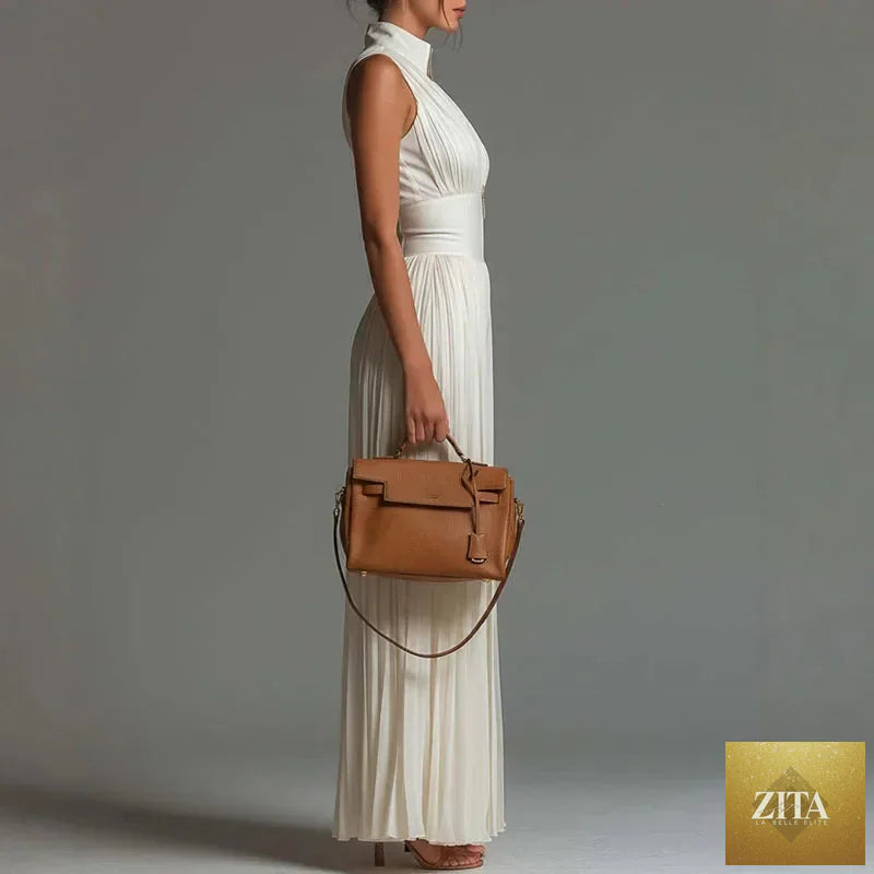 Elegant women's spring jumpsuit with stand collar, zipper detail, pleated design, high waist, wide-leg pants, sleeveless, loose fit.