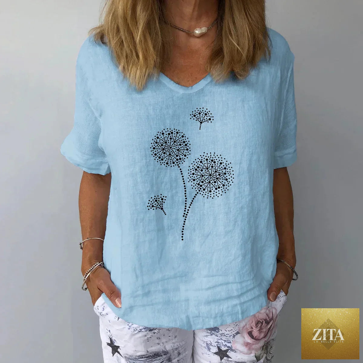 Women’s solid color cotton linen blouse, casual women shirt in a relaxed fit, styled with a collar and long sleeves.