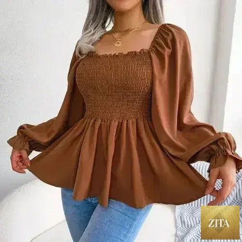 Femstylo loose fit chiffon blouse, elegant polyester top with flowy design, perfect for stylish casual or formal wear.