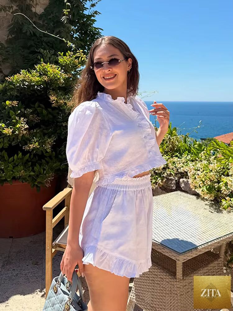Women's ruffled linen-blend cropped blouse and shorts set by Zita La Belle Elite, featuring a stylish, lightweight summer outfit.