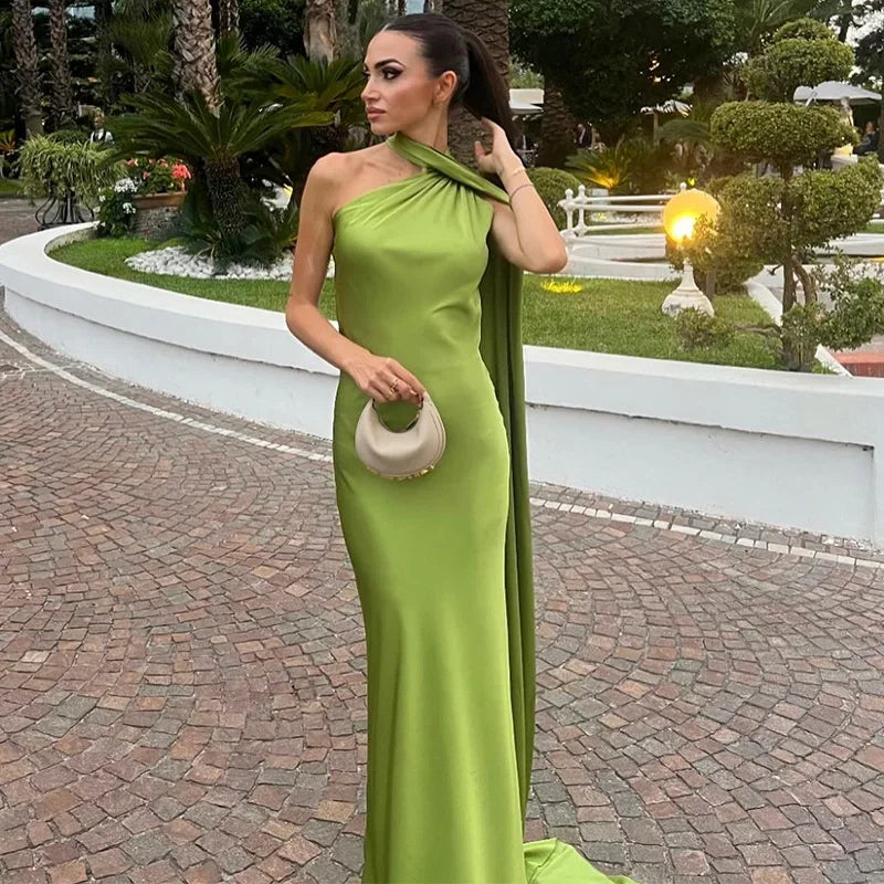 Backless lace-up maxi dress by Femstylo, sleeveless evening gown with ribbon details, perfect for formal parties and events.