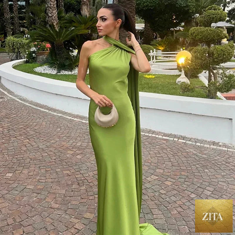 Backless lace-up maxi dress by Femstylo, sleeveless evening gown with ribbon details, perfect for formal parties and events.