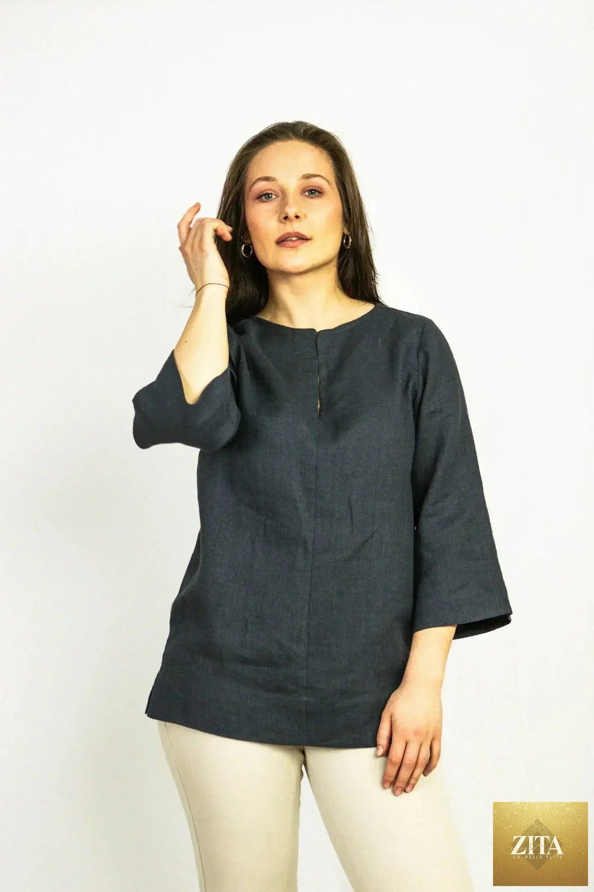 Asphalt grey linen oversize top by Femstylo, featuring a modern, relaxed fit blouse with long sleeves and a casual, comfortable style.