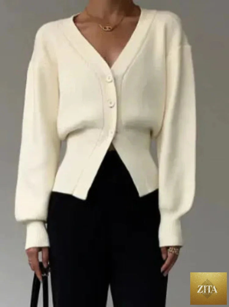 Women’s V-neck sweater from Trendy Attic Store01, featuring a cozy knit design in neutral tones.