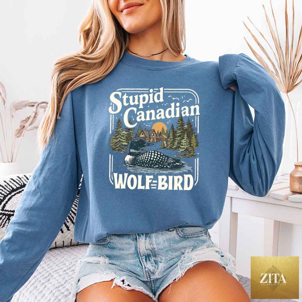 Blue Jean Comfort Colors long sleeve shirt featuring a Stupid Canadian Wolf Bird design, perfect for hockey romance BookTok fans.