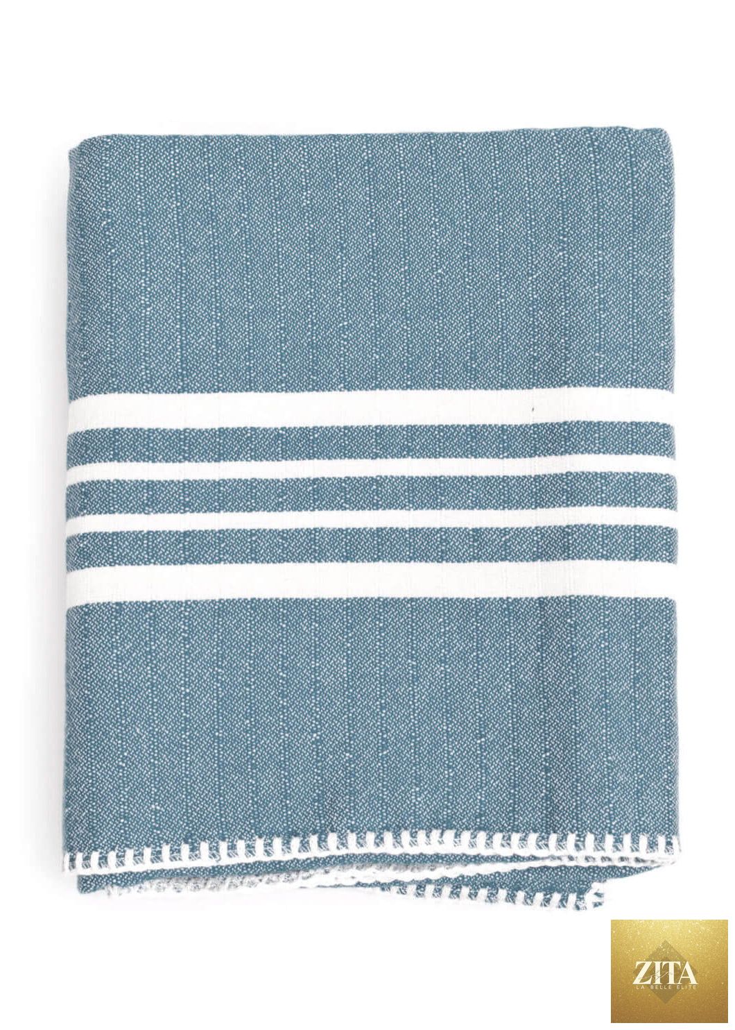 Blue Turkish towel from Zita La Belle Elite, farm house style, without fringe, displayed folded on a neutral background.